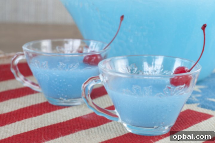Blue Lagoon Piña Colada Punch 3 Super Easy Blue Piña Colada Party Punch recipe that is non-alcoholic and perfect for fourth of July, a baby shower, or Frozen and Little mermaid birthday parties!
