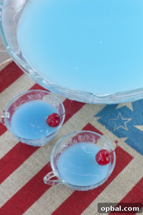 Blue Lagoon Piña Colada Punch 4 Simple, tasty Blue Piña Colada Party Punch recipe that is non-alcoholic and perfect for fourth of July, a baby shower, or Disney mermaid birthday parties!