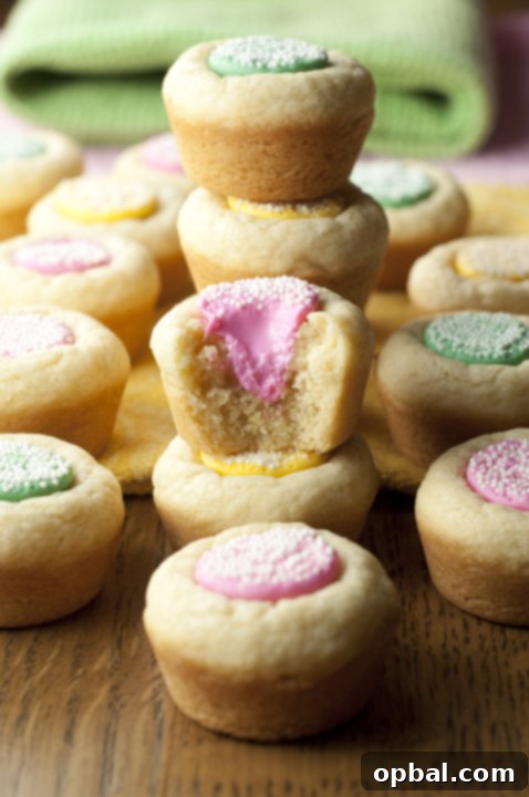 Luscious Mint Sugar Cookie Cups 2 Bite-size Melty Mint Sugar Cookie Cups recipe are chewy, buttery cookie cups with a melty mint in the middle that are great for spring! This would be the perfect dessert for baby showers, Easter, and more.