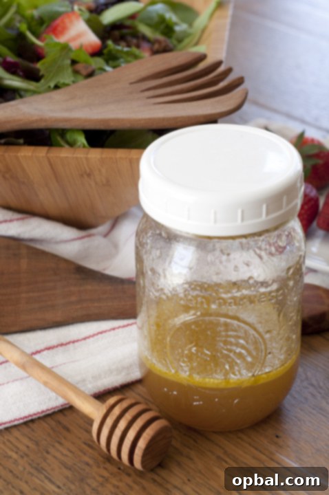 Homemade Honey Lime Vinaigrette salad dressing in a jar