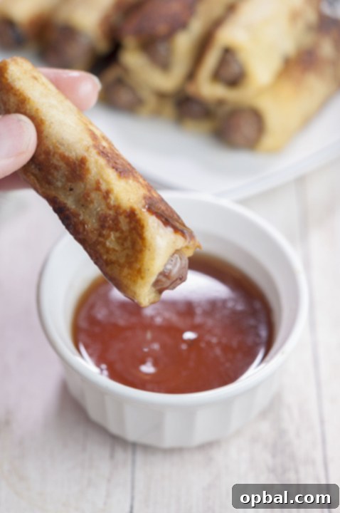 Sweet and Savory French Toast Sausage Rolls 2 This sweet and savory recipe for Mini French Toast Sausage Roll-Ups served with warm maple syrup for dunking will be the best addition to your next holiday breakfast or brunch!