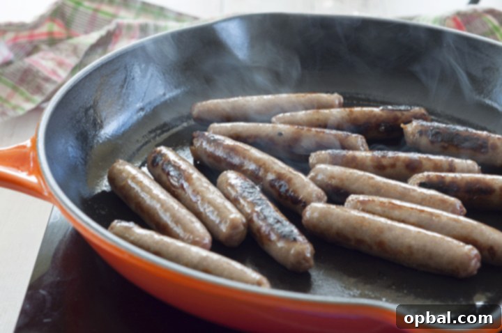 Sweet and Savory French Toast Sausage Rolls 4 Cooking breakfast sausage in the cast iron skillet.