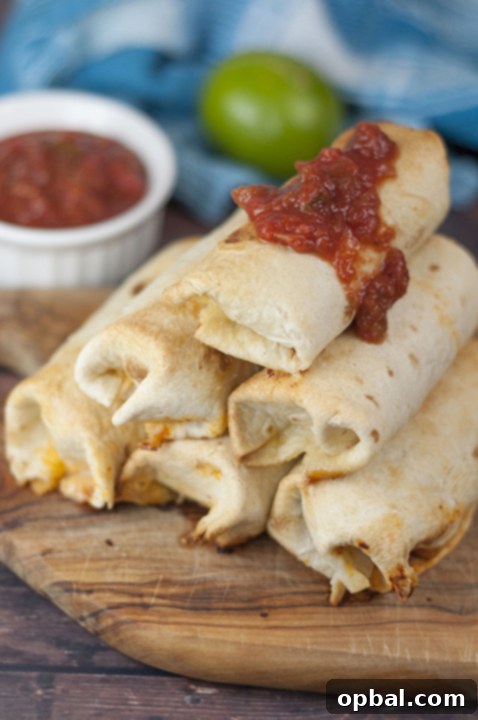 Savory Baked Breakfast Taquitos with Sausage Spinach and Egg 5 Baked Sausage, Spinach and Egg Breakfast Taquitos are crispy, cheesy, and the perfect easy recipe for a grab-and-go breakfast or breakfast for dinner!