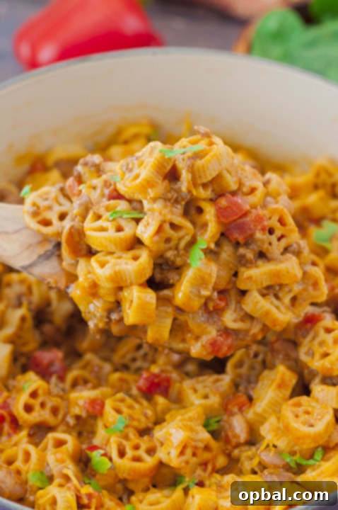 Ultimate Skillet Chili Mac 2 Hearty One-Pot Chili Mac and Cheese, a quick and delicious meal combining classic chili with creamy macaroni and cheese, ready in under 30 minutes.