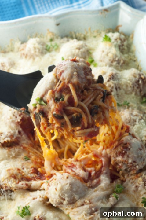 Italian Baked Spaghetti and Meatballs Casserole is a delicious change from your everyday pasta and sauce. This will be a new family favorite comfort food recipe!