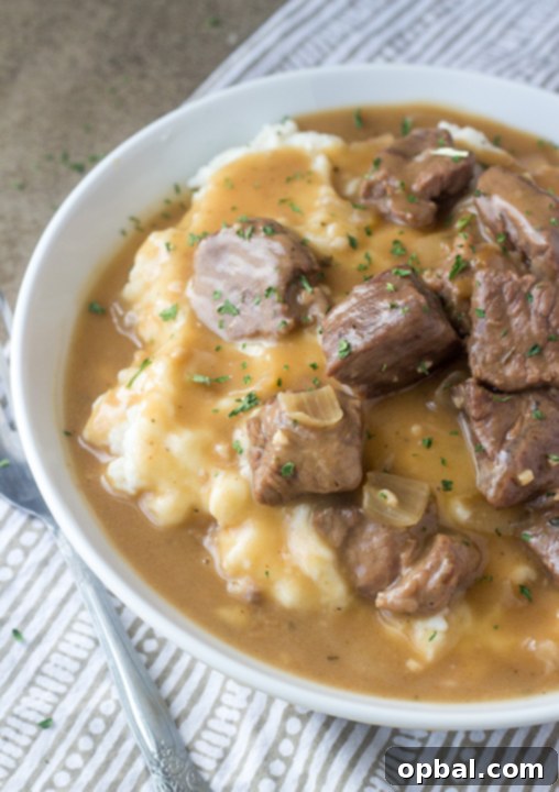 Succulent Slow Cooker Beef and Gravy 5 Slow Cooker Beef Tips and Gravy is perfect to serve to dinner guests but simple enough for a weeknight dinner recipe (such as New Year's Eve supper)! Serve it over noodles, potatoes or rice!