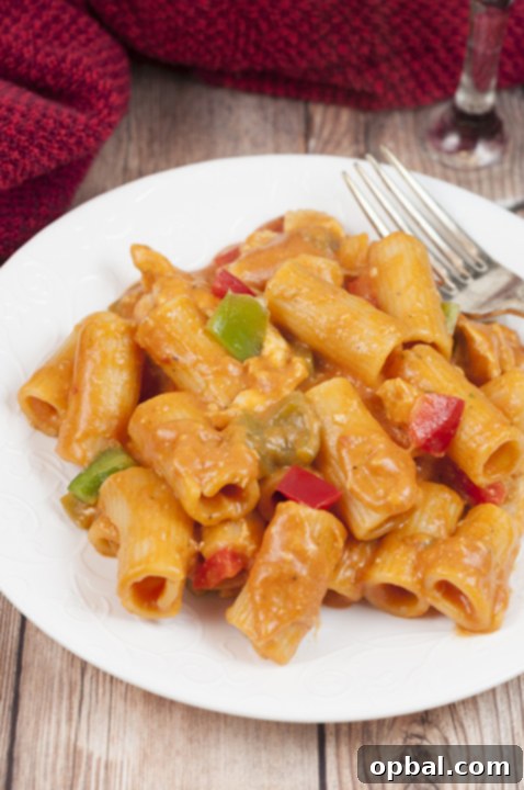 Signature Spicy Chicken Riggies 8 This simple Spicy Chicken Riggies recipe is one of my favorite Italian pasta dishes with the perfect amount of kick to it in a creamy tomato sauce. The whole family will love this for a weeknight meal, dinner party, or a date night in!