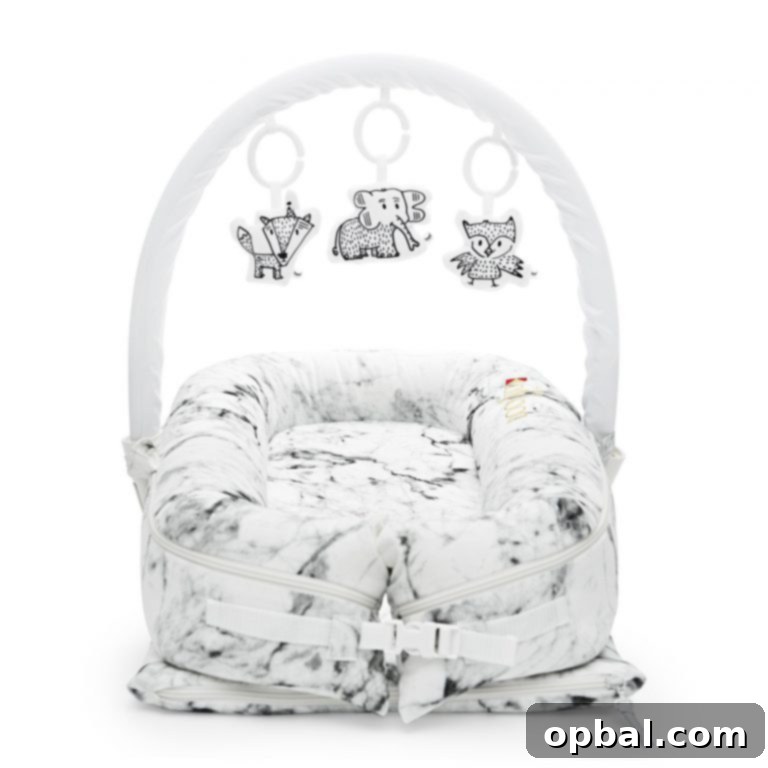 Thoughtful Presents for Moms-to-Be 10 Deluxe Marble DockATot review for babies with toy arch and toy set.