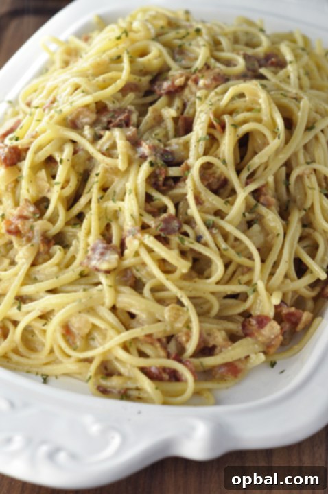 Genuine Roman Carbonara 2 Authentic Italian Pasta Carbonara recipe exactly how they make it in Rome! The eggs give it the silky, creamy texture this pasta dish is known for without all of the heavy cream.
