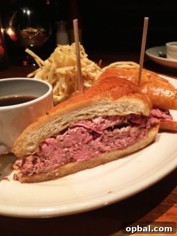 NYC Uncovered: Where to Dine and What to Experience 13 French Dip Sandwich at Hillstone Restaurant, Manhattan, NYC, renowned as the best French dip.