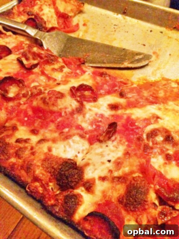 Adrienne's Pizza Bar on Stone Street in the Financial District, New York City, serving classic old-fashioned pizza.