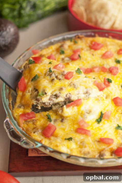 Effortless Taco Bake 2 Delicious and easy low-carb taco pie with ground beef, perfect for a quick family Mexican dinner. This savory pie comes together effortlessly, making weeknight meals a breeze.