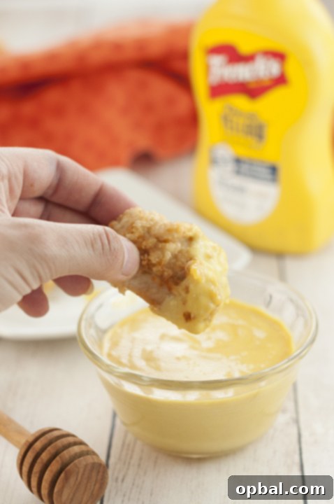 Sweet & Zesty Honey Mustard 2 Extremely easy smooth and creamy 4 ingredient Honey Mustard Dipping Sauce recipe you can dip pretzels or French fries in, spread on grilled chicken, potatoes, mini meatballs, and more!