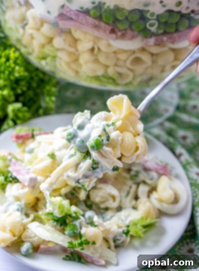 Stunning Eight-Layer Prep-Ahead Salad 5 Simple and elegant Make-Ahead Eight Layer Salad, perfect for any holiday or gathering.