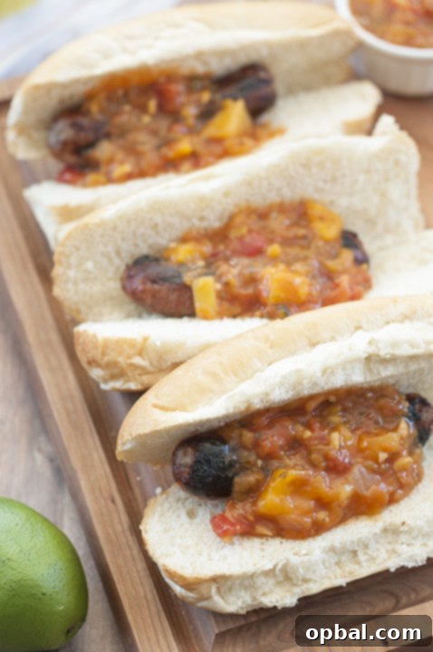 Beer Infused Brats and Zesty Mango Lime Salsa 5 Easy Grilled Beer Brats with Mango Lime Salsa is a hearty, delicious meal made right on the grill for 4th of July, cookouts, and all of those summer barbeques!