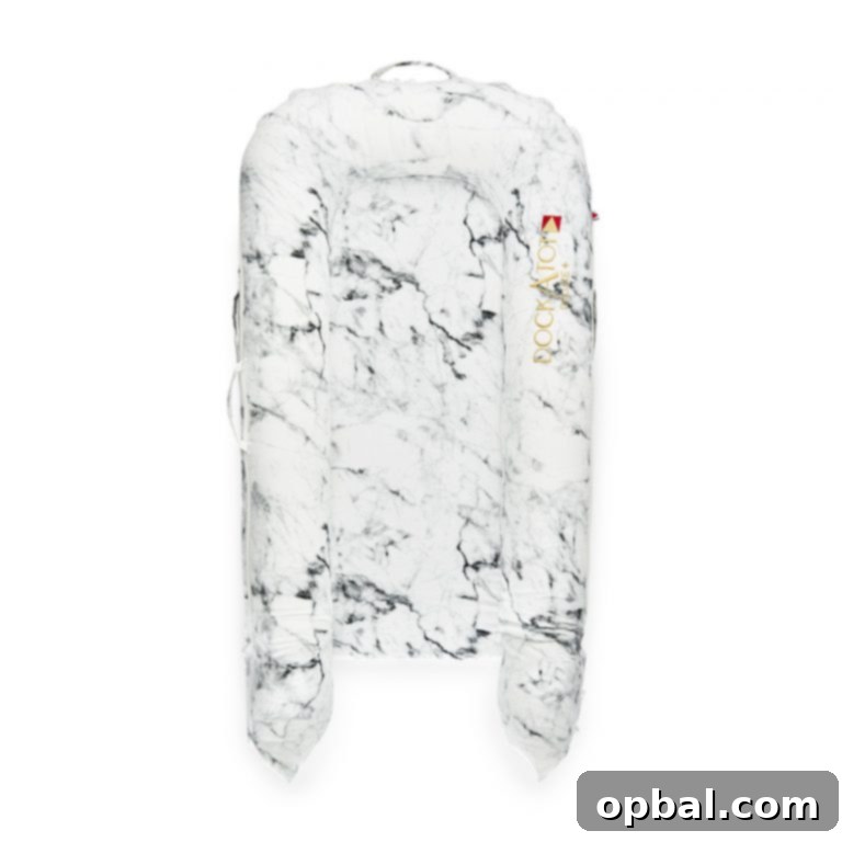 DockATot A Lifesaver for New Moms 3 Deluxe Marble DockATot review featuring a cozy baby lounger for infants
