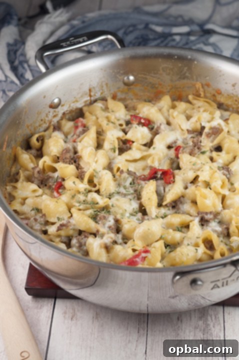 Creamy Philly Cheesesteak Pasta 4 An easy dinner recipe for Philly Cheesesteak Pasta is a cheesy comfort food dish loaded with cheese and peppers that will become a new family favorite!