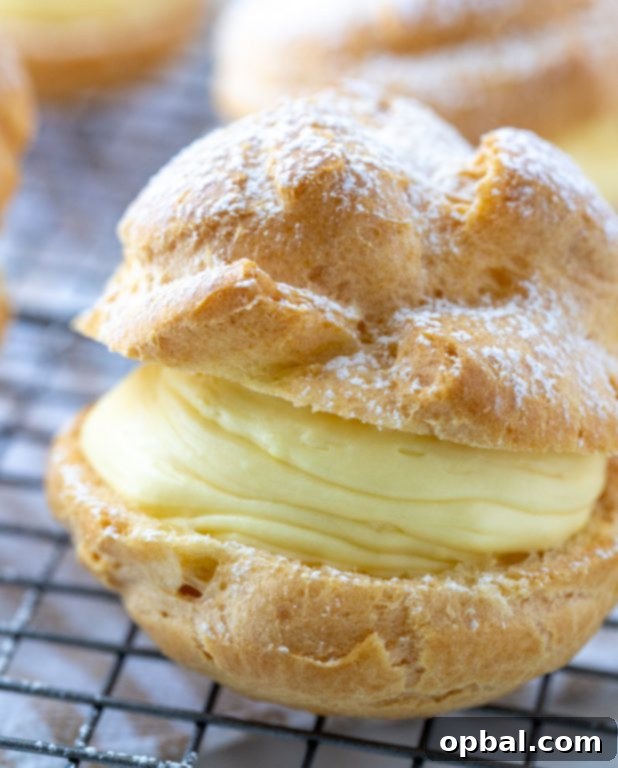 Cloud-Like Cream Puffs from Your Kitchen 5 Easy homemade vanilla cream puffs, a timeless dessert recipe perfect for Christmas, Easter, or any special occasion.