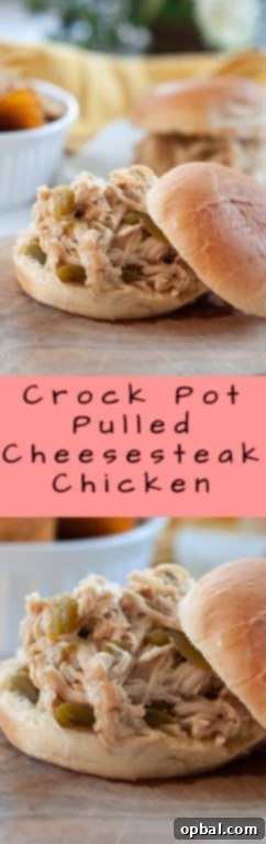 Slow Cooker Philly Cheesesteak Chicken Sandwiches 5 A small bowl of Crock Pot Pulled Cheesesteak Chicken, ready to be added to a sandwich