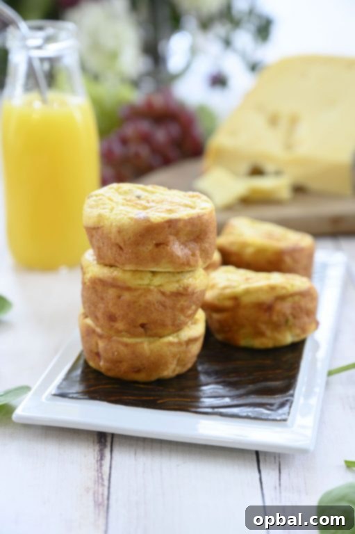 High-protein Mini Sausage, Spinach, and Jarlsberg Cheese Frittatas - ideal for quick breakfasts and meal prep