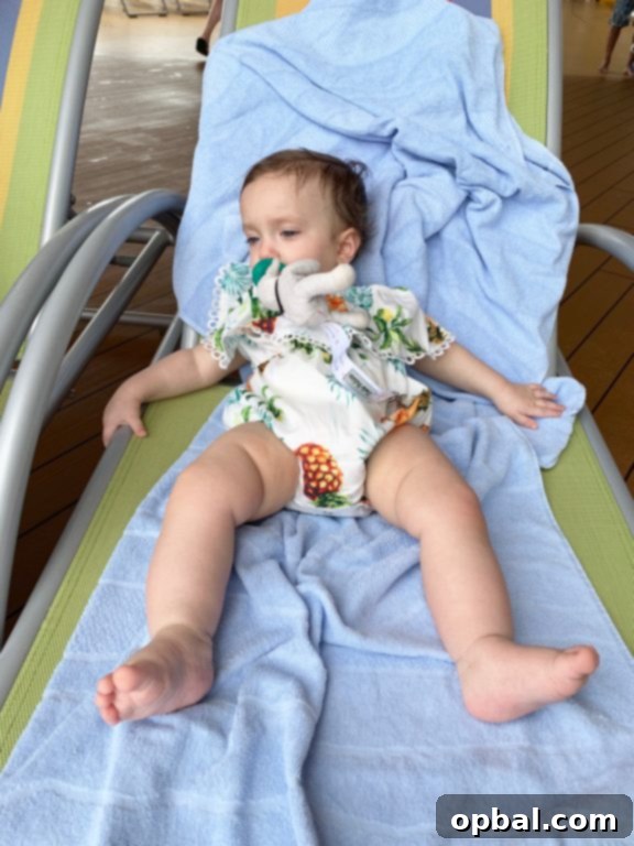 Baby on Board Your Guide to a Family Cruise 19 Naps at the pool on board Royal Caribbean Symphony of the Seas Caribbean cruise.