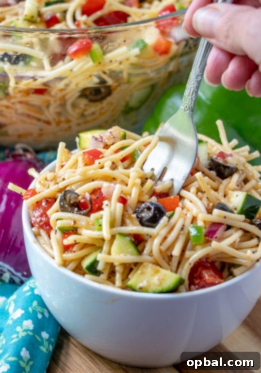 Golden State Spaghetti Medley 7 California Spaghetti Salad, an easy side dish for 4th of July, potlucks, or picnics, loaded with pasta and fresh zucchini.
