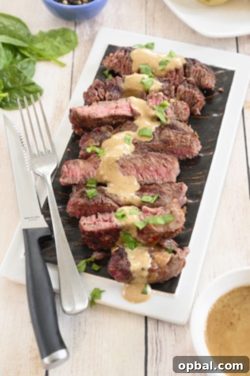 Charred Ribeye with Bold Blue Cheese Onion Cream 8 A final shot of the simple grilled ribeye steak with onion blue cheese sauce, perfectly cooked and ready to serve at home.