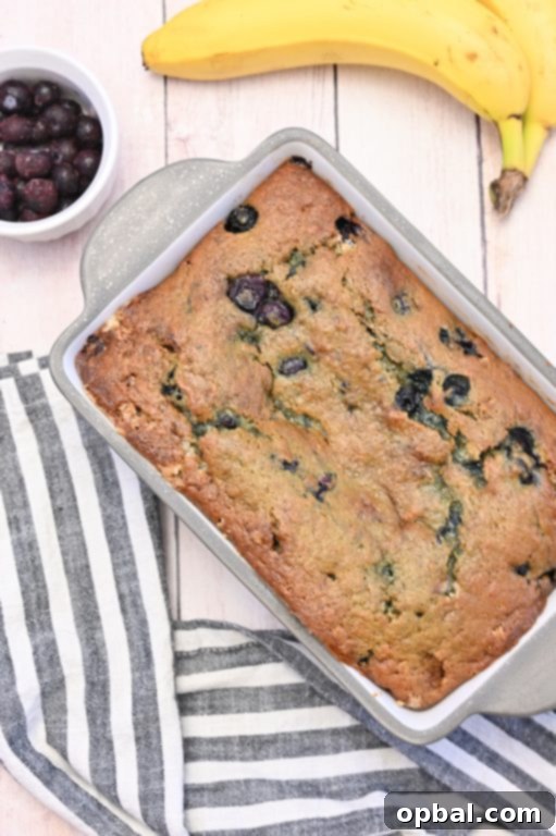 Bursting Blueberry Banana Bread 5 The best moist Blueberry Banana Bread recipe, ideal for a hearty snack or an easy, delicious breakfast.
