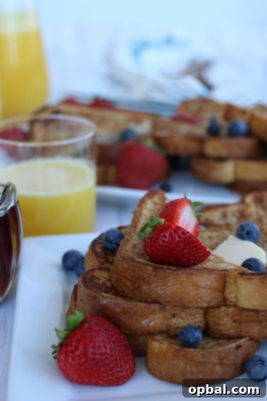 Perfect French Toast Recipe 9 Closeup of french toast with fresh berries.