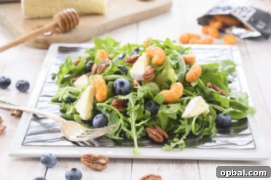 Blueberry Brie Pecan Salad with Crispy Protein Puffs 5 Delicious and easy healthy salad recipe with fruit: Blueberry-Brie Pecan Salad enhanced by FitJoy Protein Puff Croutons.