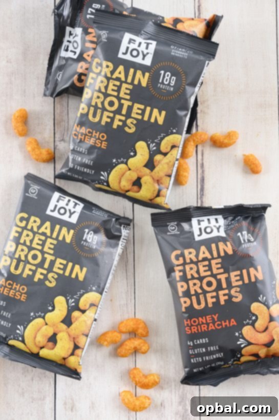 Blueberry Brie Pecan Salad with Crispy Protein Puffs 6 Assortment of FitJoy grain-free protein puffs, a healthy snack alternative.