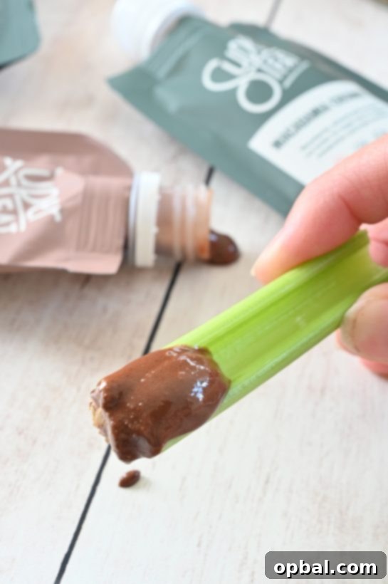 Mason Jar Almond Butter Dipper Duo 6 Gluten-free, vegan mason Jar Pretzel, Celery, Almond Butter Snack with SuperFat nut butter is the perfect healthy on-the-go snack loaded with protein to give you a quick boost of energy any time of day!