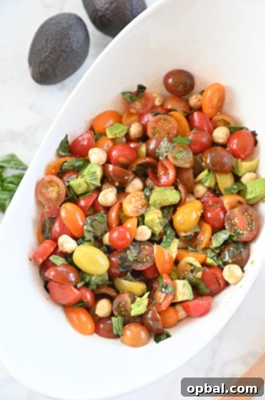 Creamy Caprese Avocado Medley 2 Vibrant Caprese Avocado Salad with fresh mozzarella, cherry tomatoes, basil, and creamy avocado