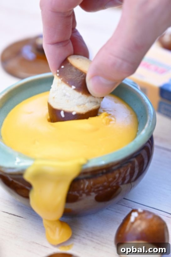Tangy Hard Cider Cheddar Fondue 3 Sharp Cheddar Hard Cider Fondue recipe, ideal for game day gatherings, sophisticated party appetizers, or cozy dinners. Pair with your favorite dippers for an irresistible treat!