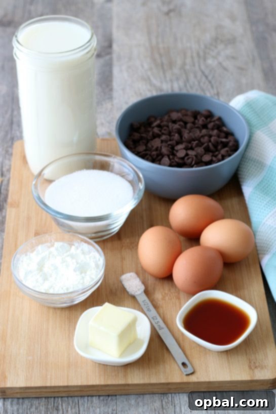 Decadent Chocolate Silk Pie 4 All the necessary ingredients for crafting a delicious homemade chocolate pie are neatly laid out on a kitchen counter, ready for the baking process.