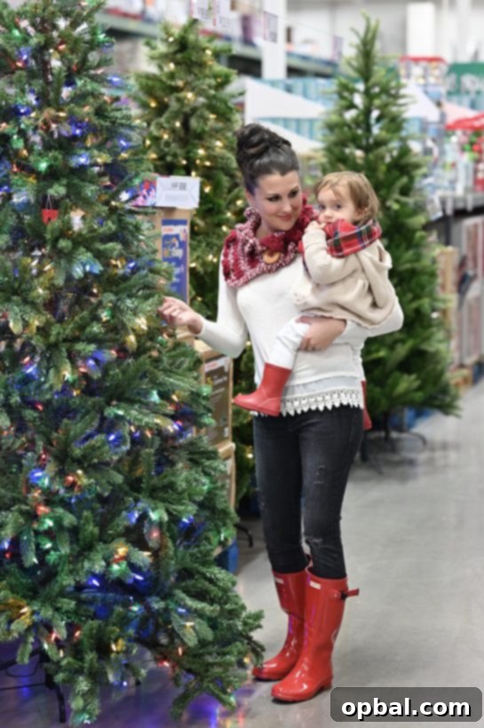 Elevate Your Holiday Entertaining with BJ's 4 Holding my toddler at BJ's wholesale club