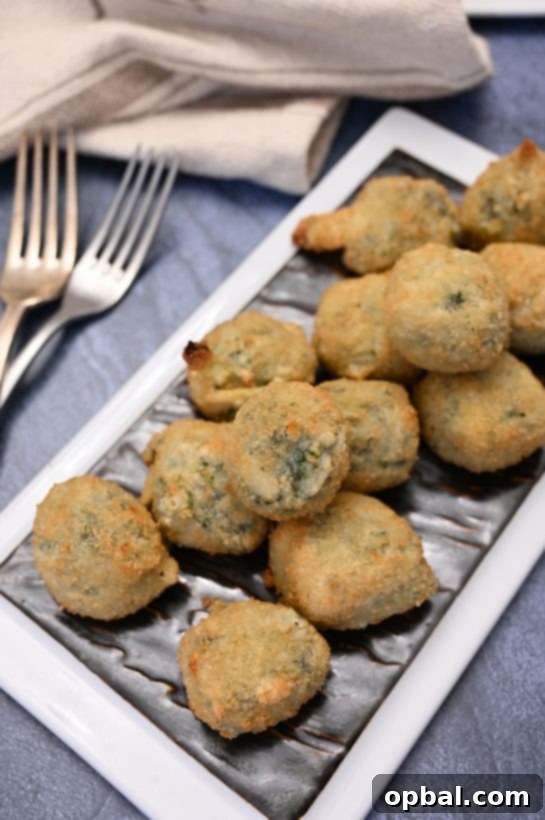 Elevate Your Holiday Entertaining with BJ's 6 Wellsley Farm Spinach Artichoke Bites from BJ's Wholesale Club.