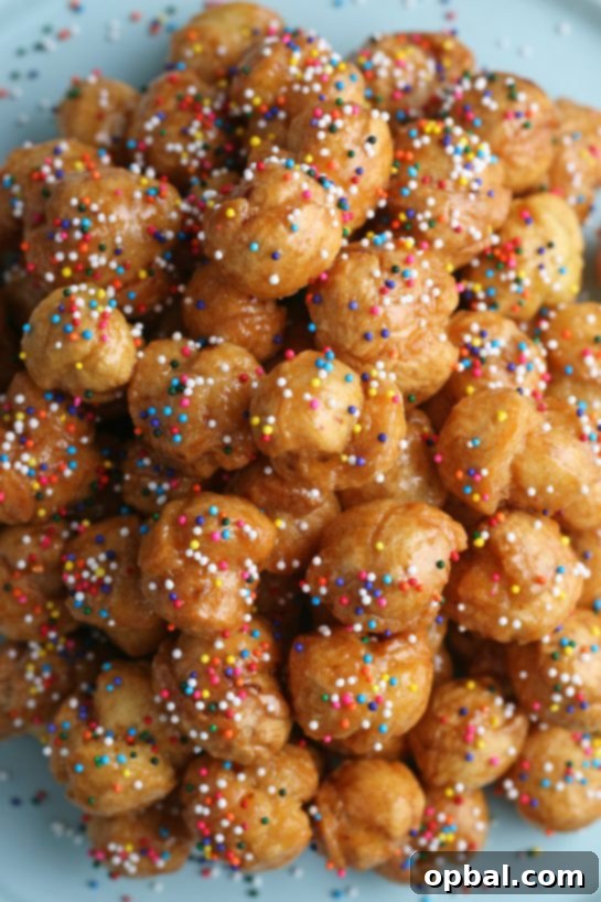 Golden Struffoli: Italian Honey Delights 13 A top down shot of the finished struffoli recipe, perfectly brown and ready to be enjoyed.