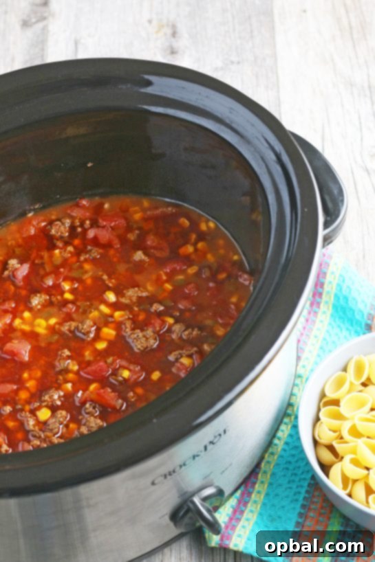 Easy Crockpot Creamy Taco Pasta 9 The last thing we need to do to make this Mexican pasta salad is add the pasta to the slow cooker!