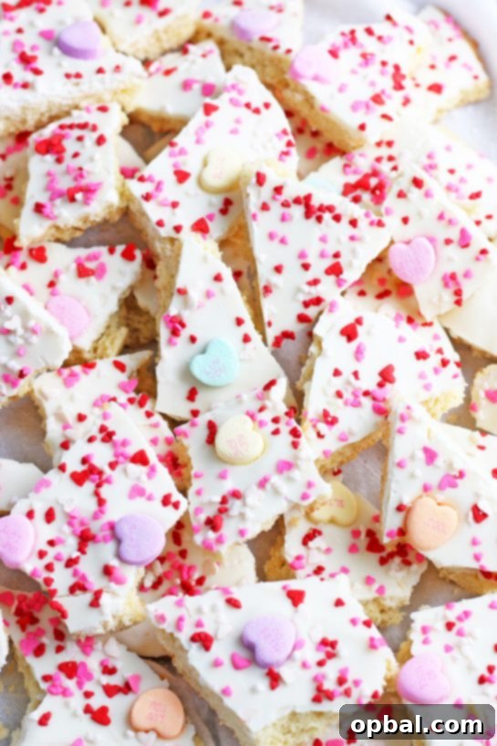 A close-up look at the conversation heart cookies broken into chunks and ready to be eaten, showcasing their festive appeal.