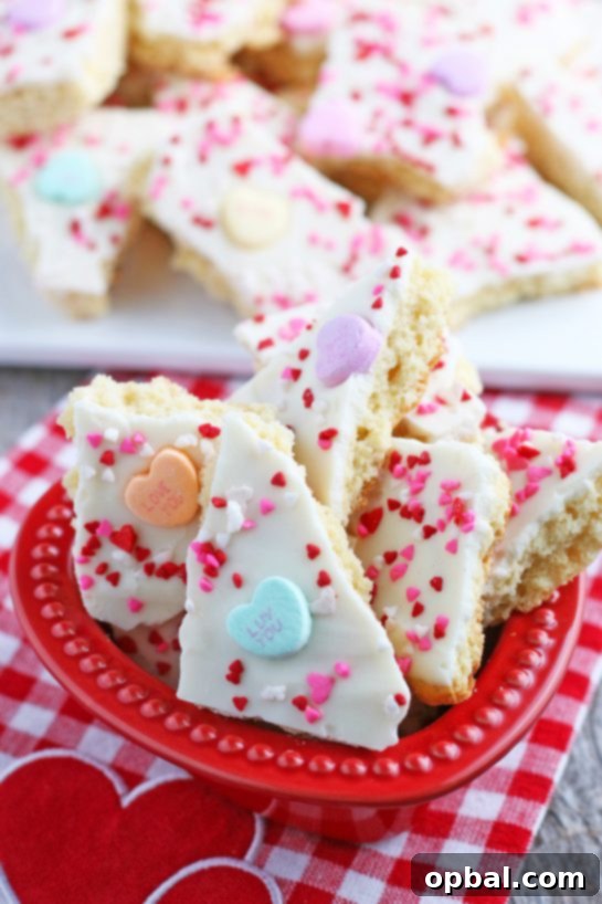 A bowl full of the conversation hearts cookie bark ready to be shared and enjoyed by everyone.