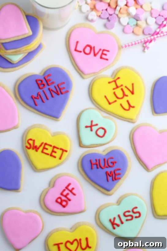 Crafting Edible Love Notes: Decorating Valentine's Conversation Heart Cookies 11 A vibrant collection of freshly decorated sugar cookies, each a unique masterpiece adorned with colorful royal icing and sweet messages, beautifully arranged and ready for sharing and enjoyment.