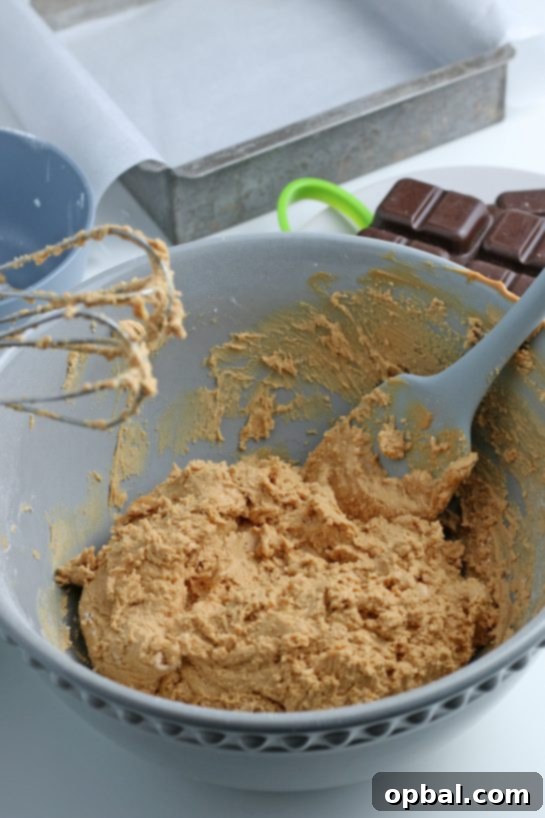 Decadent Chocolate Peanut Butter Eggs 8 A close-up showing the irresistible peanut butter egg batter, so delicious it's a challenge not to sneak a taste before it's even finished!