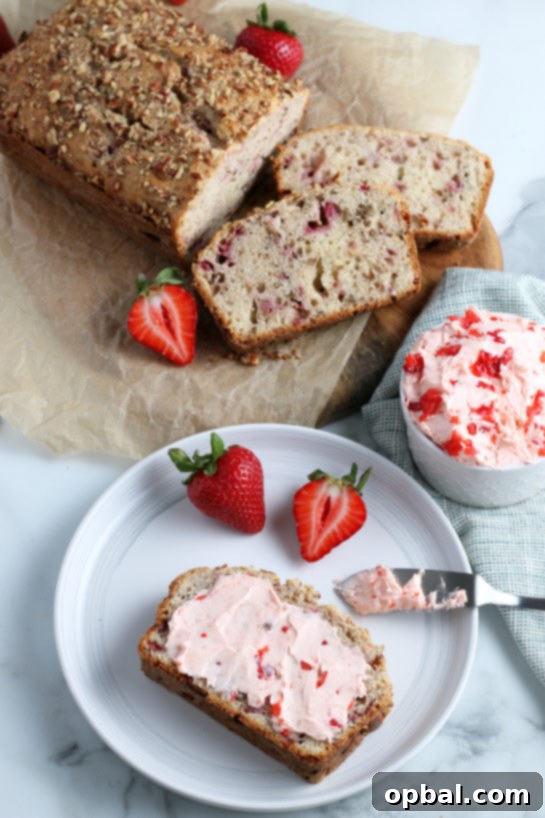 Luscious Strawberry Cream Bread 15 A slice of strawberry and cream bread with a generous spread of strawberry cream cheese.