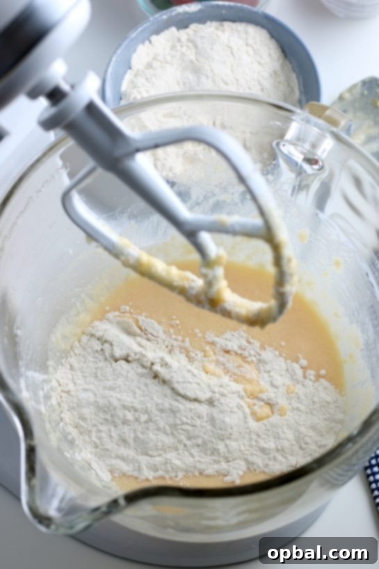 Luscious Strawberry Cream Bread 10 Dry ingredients gradually added to the wet batter in a stand mixer.
