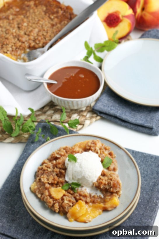 Sun-Kissed Peach Crumble 15 The ultimate easy fresh peach crisp, a deliciously sweet and juicy dessert with an irresistible crumb topping, ideal for summer and fall