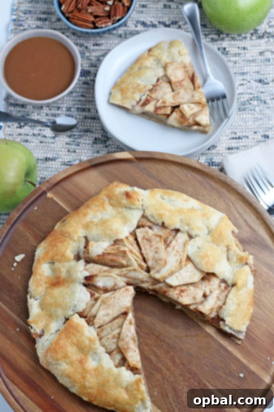 Rustic Apple Tart 2 A beautifully baked apple crostata, rustic and golden-brown, invitingly presented as a perfect fall dessert.