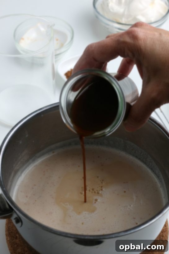 Cozy Autumn Pumpkin Spice Latte 8 Adding the brewed coffee or espresso to the pot to make my Homemade Pumpkin Spice Latte recipe