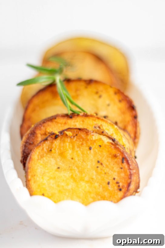 Velvet Roasted Potatoes 15 A full pan of melting potatoes showcasing their golden edges and tender texture, perfect for holiday feasts.