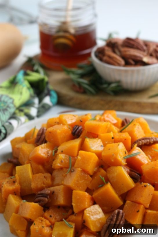 Sweet Caramelized Butternut 12 Finished Roasted Butternut Squash, garnished with fresh herbs, ready to serve